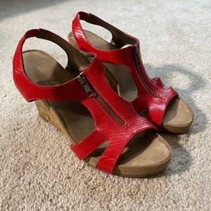 Red zip-up wedge sandals